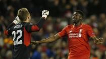 Britain Football Soccer - Liverpool v Villarreal - UEFA Europa League Semi Final Second Leg - Anfield, Liverpool, England - 5/5/16. Liverpool's Simon Mignolet and Kolo Toure celebrate after the game. Reuters / Phil Noble