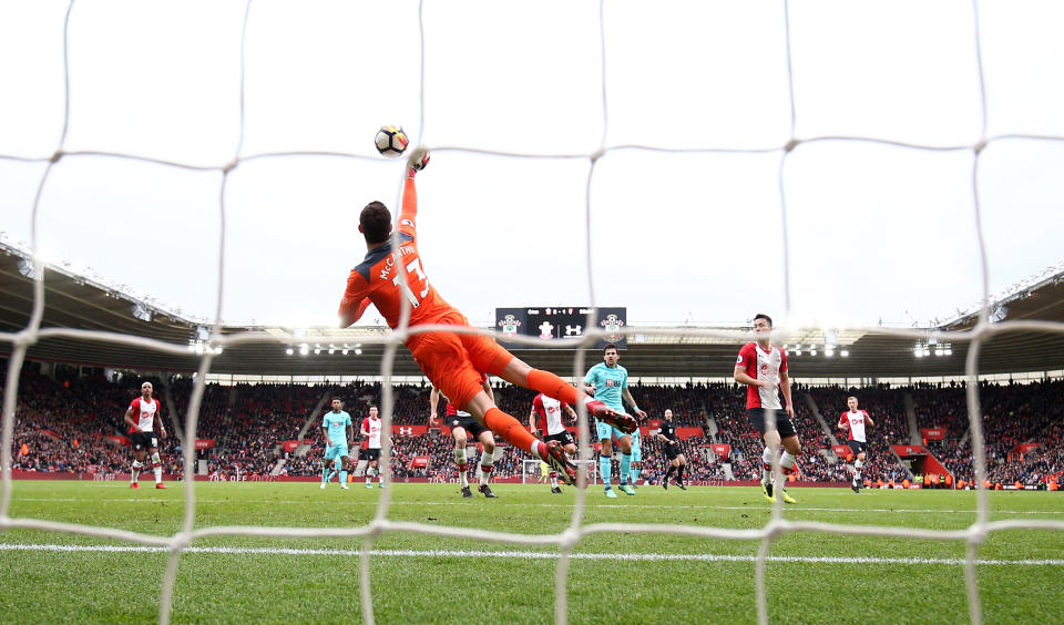 Alex McCarthy saves a shot for Southampton against Bournemouth