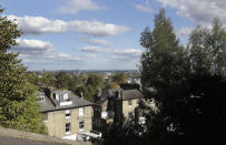 This Friday, Sept. 28, 2018, photo shows a view from the top floor of a flat that will be available for short term rent in London. Hotel companies are getting into the business of home-sharing. Marriott has been testing this in London in partnership with a home-sharing company called Hostmaker. (AP Photo/Kirsty Wigglesworth)