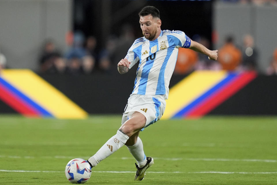 Argentina's Lionel Messi dribbles during a Copa America Group A soccer match against Chile in East Rutherford, N.J., Tuesday, June 25, 2024. (AP Photo/Julia Nikhinson)