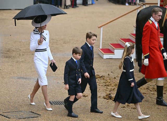 <p>JUSTIN TALLIS/AFP via Getty</p> Kate Middleton and her children at Trooping the Colour 2024