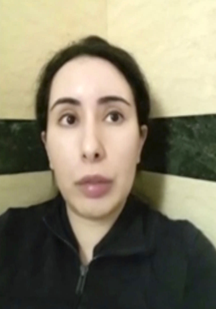 This undated image taken from video in an unknown location shows Sheikha Latifa bint Mohammed Al Maktoum speaking into a mobile phone camera. The United Nations’ human rights body said Wednesday Feb. 17, 2021, it will seek information from the United Arab Emirates about the daughter of Dubai’s powerful ruler after she said in video messages that she was being imprisoned in a heavily guarded villa. (#FreeLatifa campaign – Tiina Jauhiainen/David Haigh via AP)