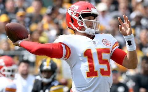 Kansas City Chiefs quarterback Patrick Mahomes (15) plays in the first quarter of an NFL football game against the Pittsburgh Steelers - Credit: AP Photo/Don Wright