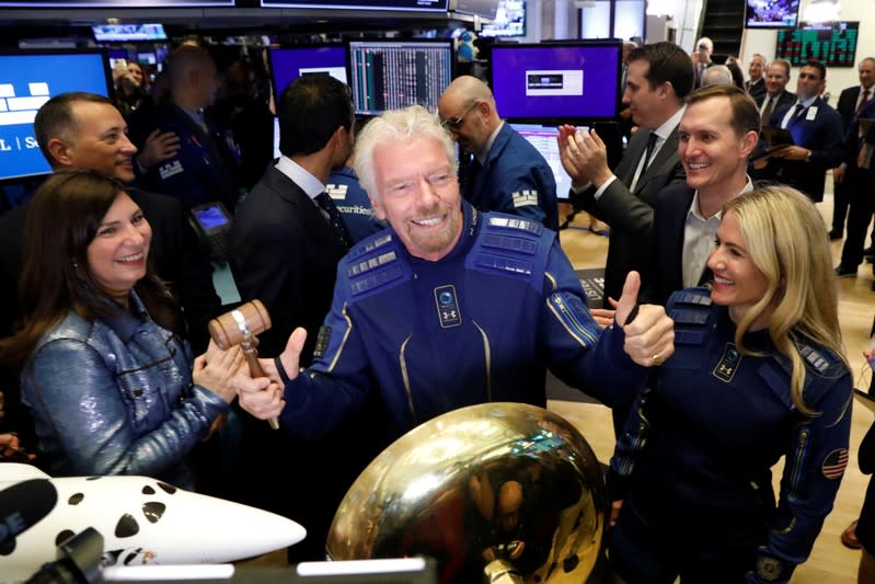 Sir Richard Branson rings bell on floor of New York Stock Exchange as Virgin Galactic (SPCE) begins public trading in New York