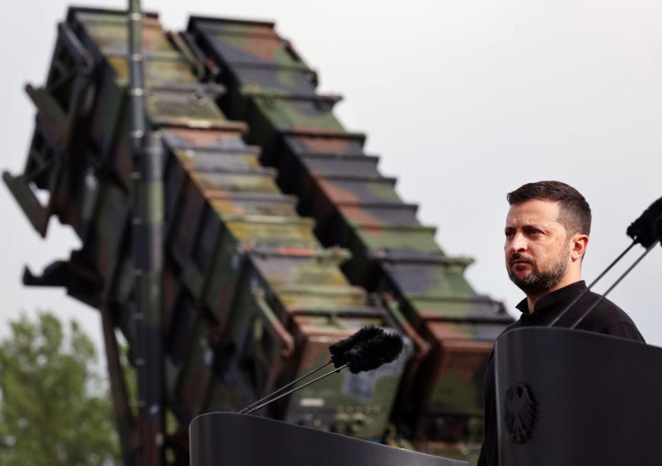 Ukrainian President Volodymyr Zelenskyy standing in front of a Patriot anti-aircraft missile system during his visit to a military training area in Germany on June 11, 2024.