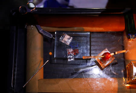 Drug paraphernalia and sachets of "Shabu", or methamphetamine, are pictured at a drug den in Manila, Philippines February 13, 2017. REUTERS/Erik De Castro