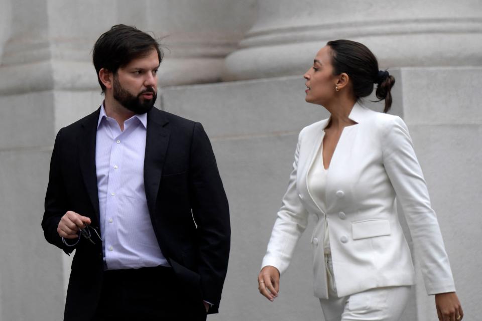 Chilean President Gabriel Boric walks with U.S. Rep. Alexandria Ocasio-Cortez (D-NY) upon their arrival at La Moneda Palace in Santiago, Chile, on August 18, 2023. A group of U.S. lawmakers traveled to Chile to learn about efforts to defend its democracy ahead of the 50th anniversary of the military coup led by Gen. Augusto Pinochet.