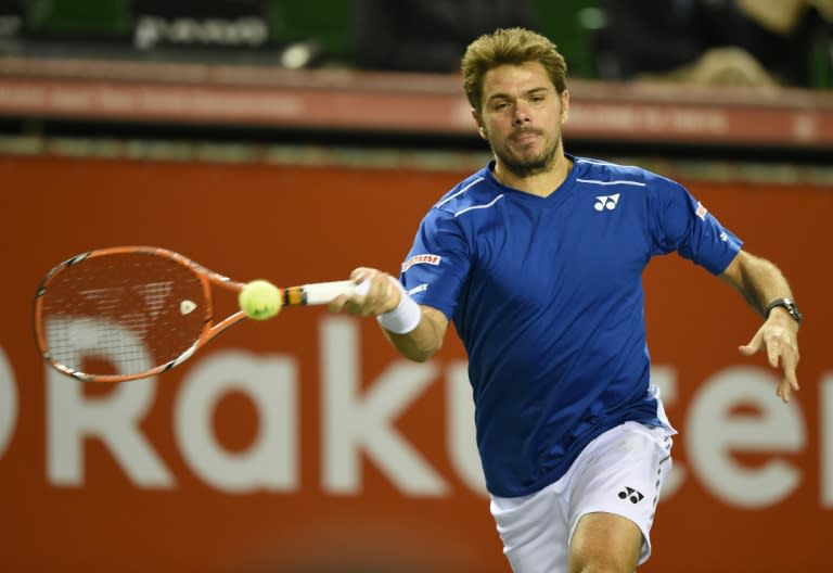 Switzerland's Stan Wawrinka returns the ball against Tatsuma Ito of Japan during their second round match at the Japan Open in Tokyo, on October 7, 2015