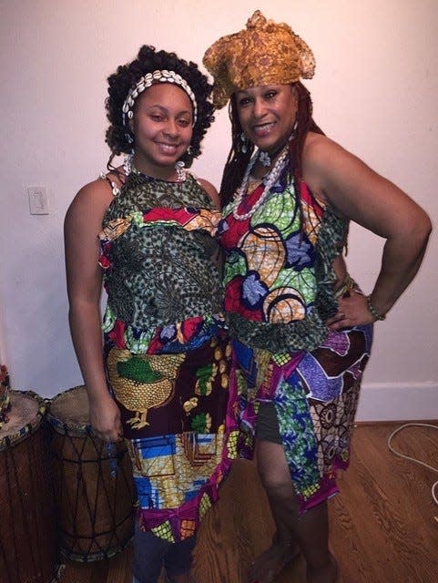Nailah Bulley, 32, and her mother Afua Kouyate, 65, pose in traditional West African clothing. The duo will work in an apprenticeship program to study, perform and preserve West African dance.
