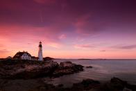 <p>Shades of pink and purple fill the sky over the Portland Head Lighthouse in Portland, Maine // June 03, 2013</p>