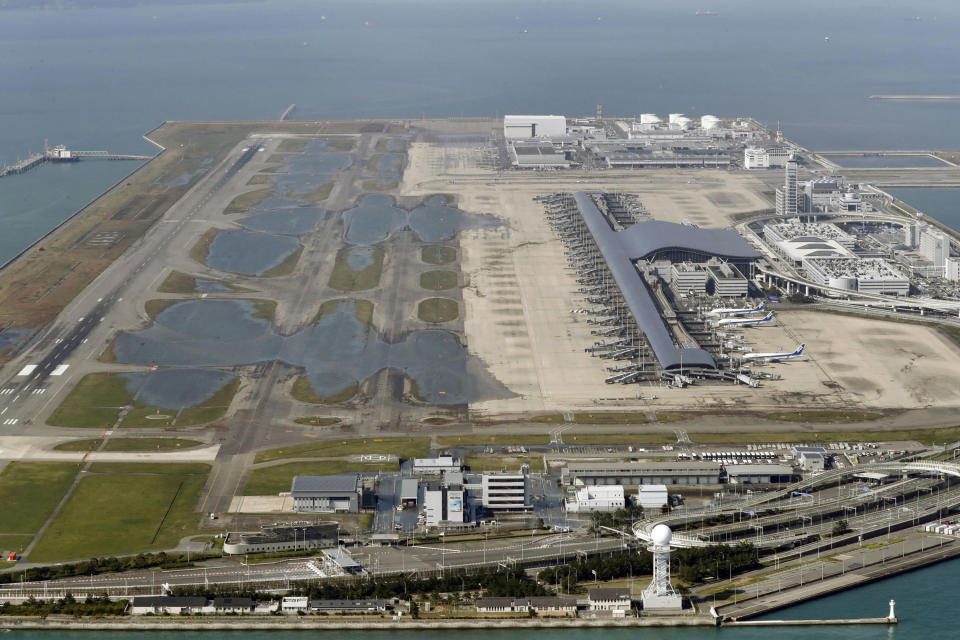 Typhoon leaves major airport closed and destruction in Japan