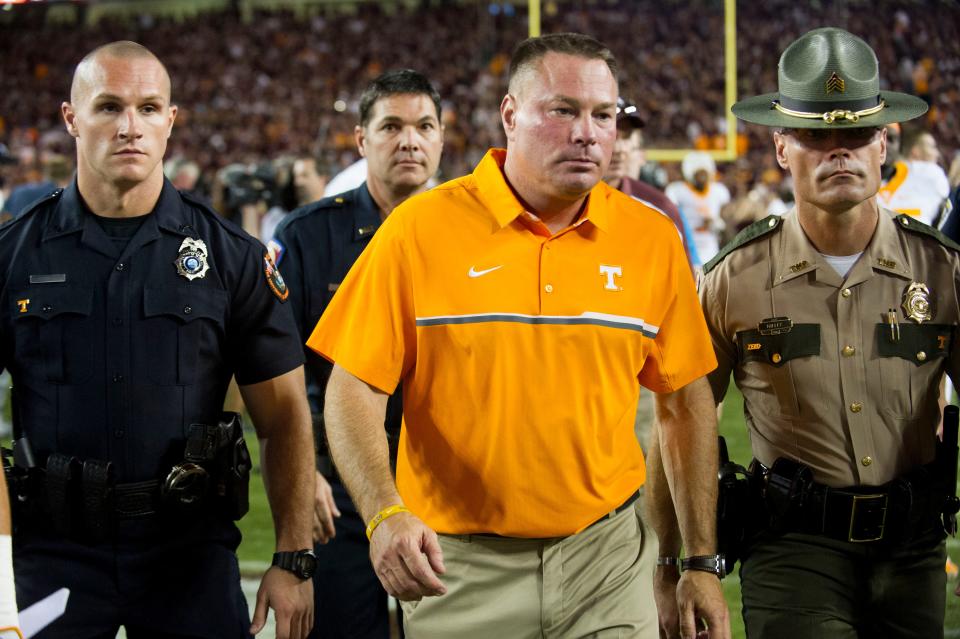 Tennessee head coach Butch Jones walk off the field after the loss to Texas A&M on Saturday, October 8, 2016. (SAUL YOUNG/NEWS SENTINEL) 