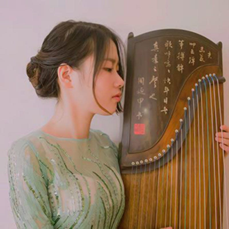Guzheng player Anwei Wang of Boston will be one of the featured performers at Ames Town & Gown's concert at 7:30 p.m. Sunday.