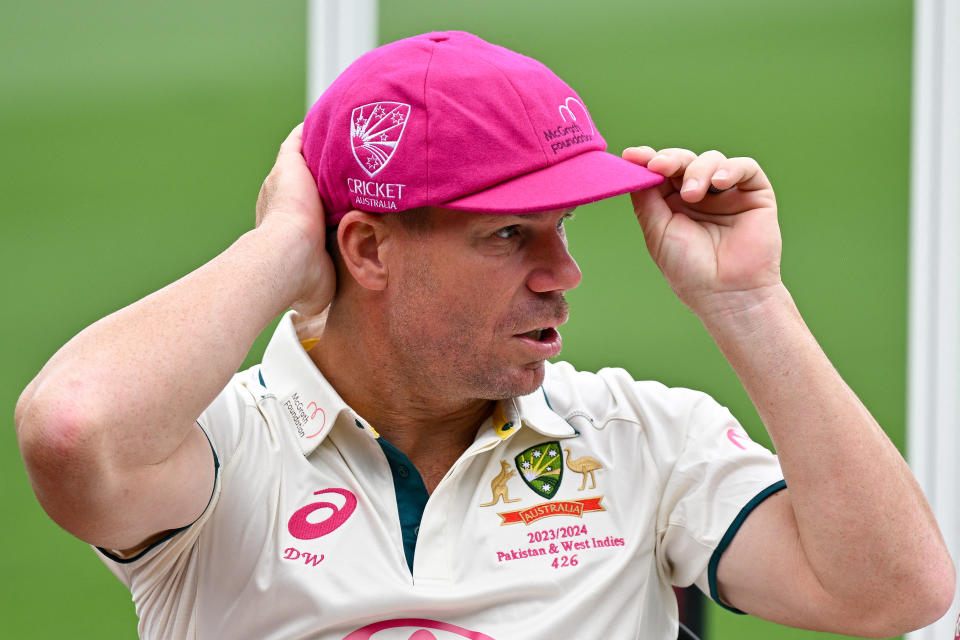 Australia's David Warner looks on before a team photo ahead of the third Test match between Australia and Pakistan at the Sydney Cricket Ground in Sydney on January 1, 2024. (Photo by Izhar KHAN / AFP) / -- IMAGE RESTRICTED TO EDITORIAL USE - STRICTLY NO COMMERCIAL USE -- (Photo by IZHAR KHAN/AFP via Getty Images)