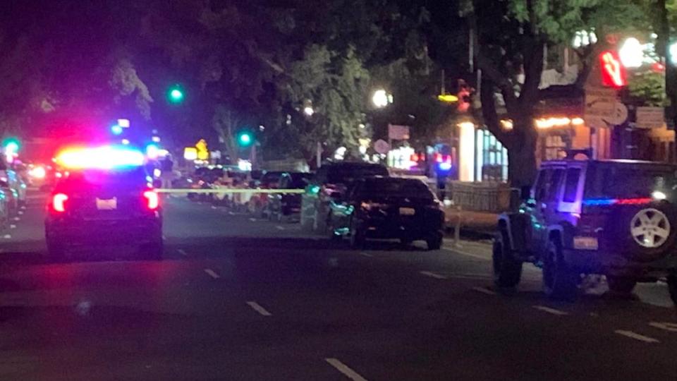 Police are see. on J Street between 27th and 28th streets Sunday, Sept. 25, 2022, following a shooting in the midtown section of Sacramento, Calif. One person was killed in the shooting along a popular block just before 1 a.m.