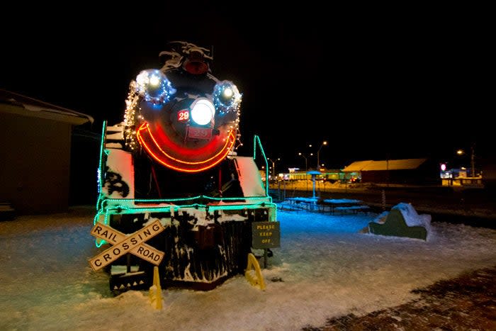 The Polar Express train is all lit up and ready to go to the North Pole.