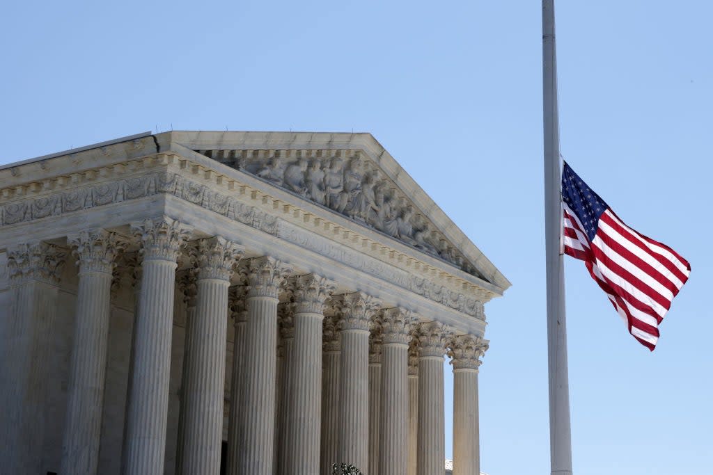 The flag outside the US Supreme Court has flown at half staff since the death on Thursday of Justice Ruth Bader Ginsburg. (Getty Images)