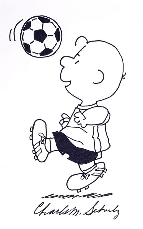 Charlie Brown playing soccer by Charles M Schulz American 1922-2000 Pen and Ink