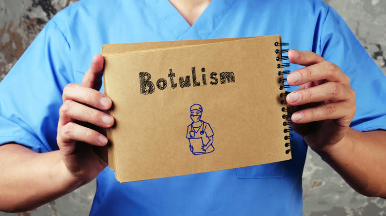 Hands holding botulism sign