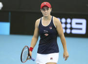 Ashleigh Barty of Australia reacts after missing a shot during her match against Jennifer Brady of the United States at the Brisbane International tennis tournament in Brisbane, Australia, Thursday, Jan. 9, 2020. (AP Photo/Tertius Pickard)