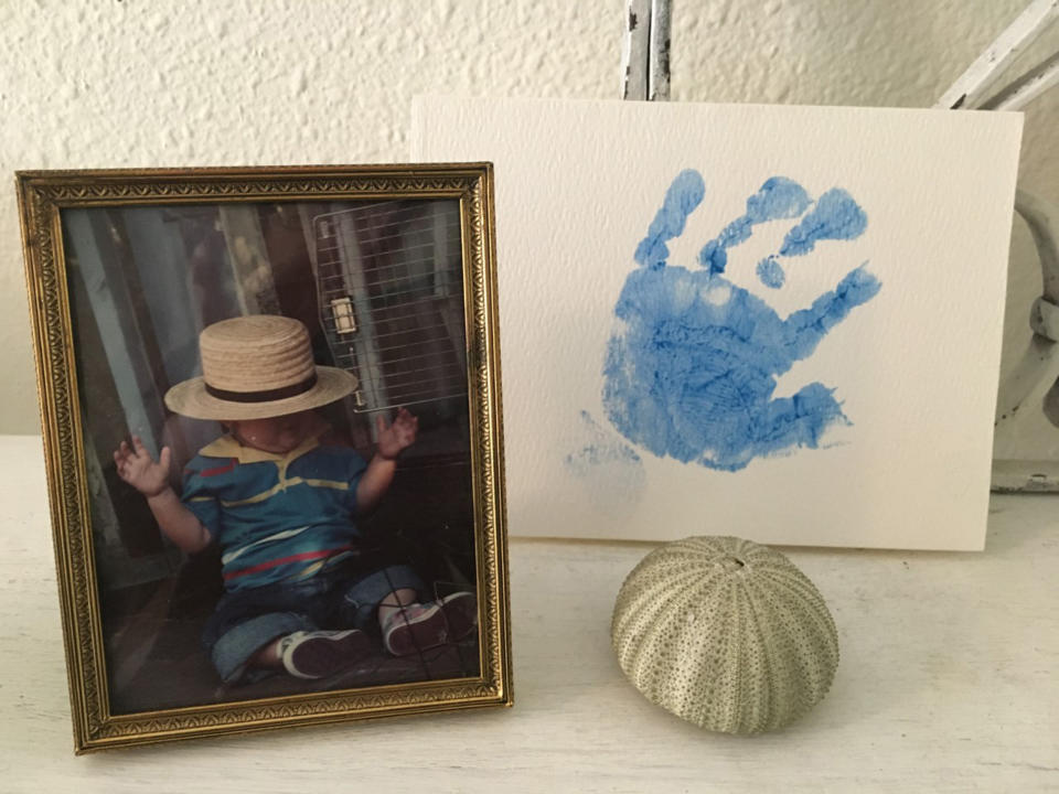 Carol Smith keeps her son Christopher's photo and handprint on a shelf in her home. (Courtesy Carol Smith)