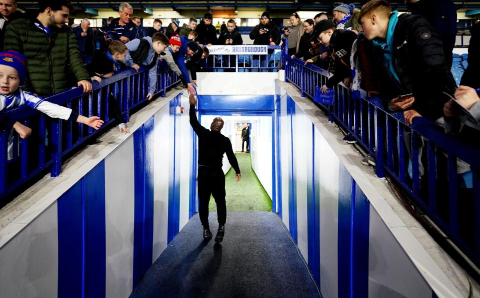 Darren Moore shakes hands with Sheffield Wednesday fans