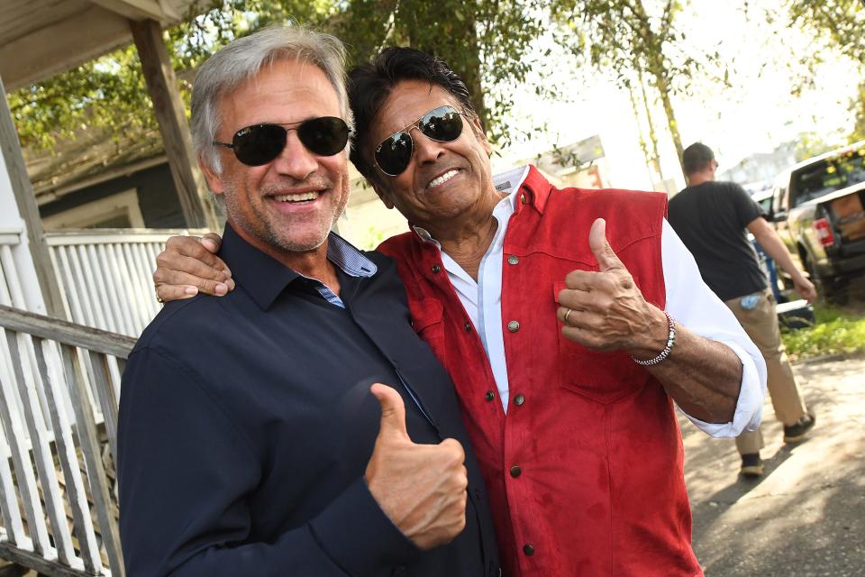 Erik Estrada talks with Mayor Bill Saffo on the set of Divine Renovations at 708 Dawson Street in Wilmington, N.C. Wednesday Sept. 28, 2022. The actor was in Wilmington to film the show at a few locations throughout the week.  