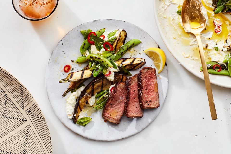 Grilled Steak With Peas and Eggplant Over Whipped Ricotta