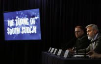 US actor and activist George Clooney speaks at a press conference about South Sudan in London, Thursday, Sept. 19, 2019. The largest multinational oil consortium in South Sudan is "proactively participating in the destruction" of the country, the actor George Clooney and co-founder of The Sentry watchdog group told The Associated Press this week. (AP Photo/Alastair Grant)