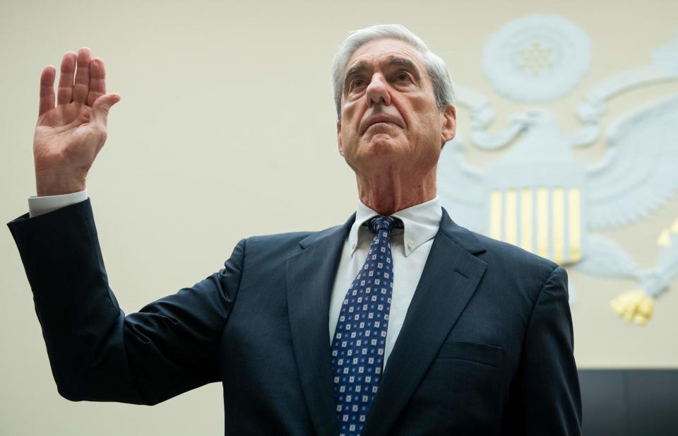 Former Special Counsel Robert Mueller is sworn in for his testimony before the House Select Committee on Intelligence hearing on Capitol Hill in Washington, DC on July 24, 2019.