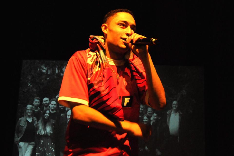 Family man: Loyle Carner performed with a black-and- white photograph of his family in the background: Steve Gillett/Livepix