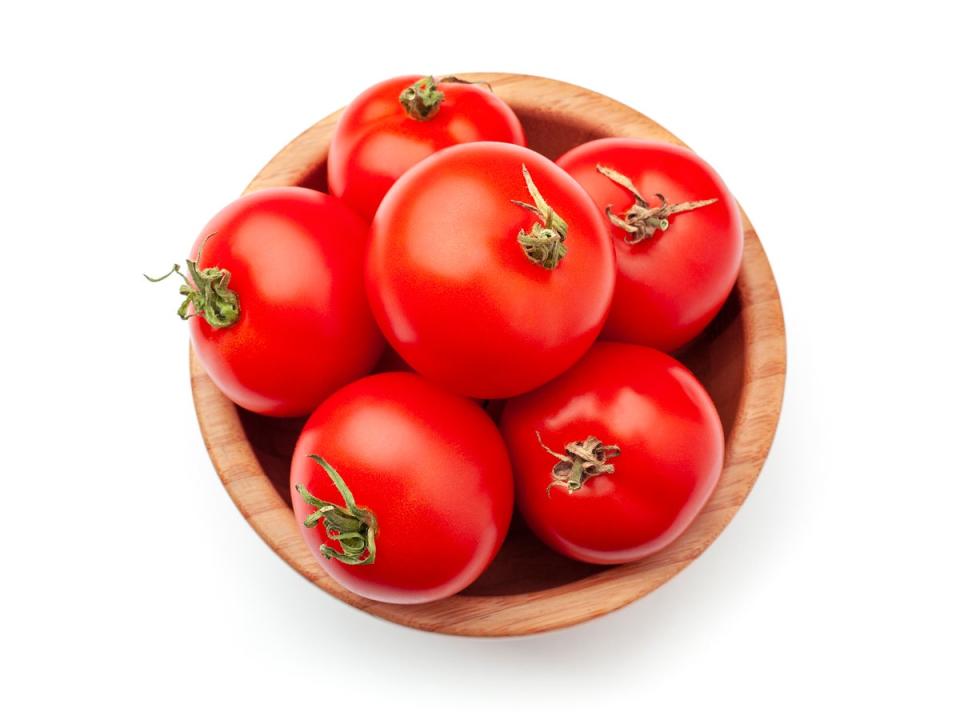 Tomatoes are best kept at room temperature, not the fridge (Getty/iStock)