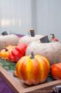 <p>Two words: Dollar Store. That's where you can go to find all the supplies you need for this easy, yet festive Thanksgiving centerpiece. </p><p><strong>Get the tutorial at <a rel="nofollow noopener" href="https://housefulofhandmade.com/easy-rustic-pumpkins-from-dollar-store-pumpkins/" target="_blank" data-ylk="slk:Houseful of Homemade.;elm:context_link;itc:0;sec:content-canvas" class="link ">Houseful of Homemade. </a></strong></p>