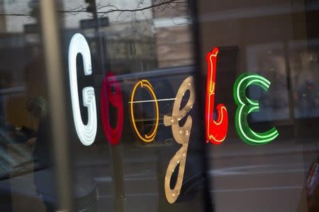 The Google signage is seen at the company's offices in New York January 8, 2013. REUTERS/Andrew Kelly