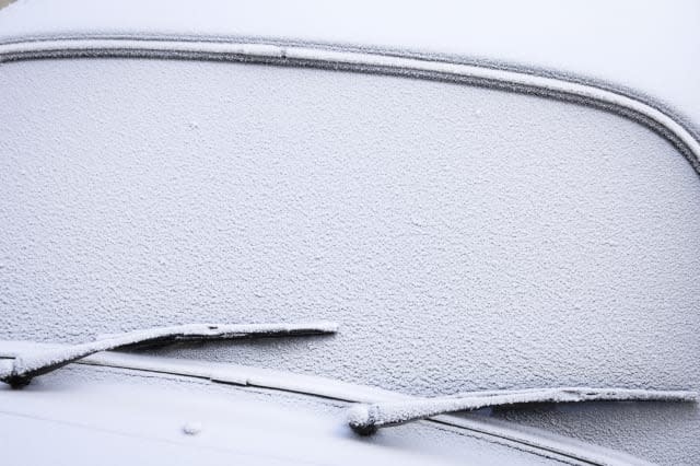 front window of a car in winter - space for text