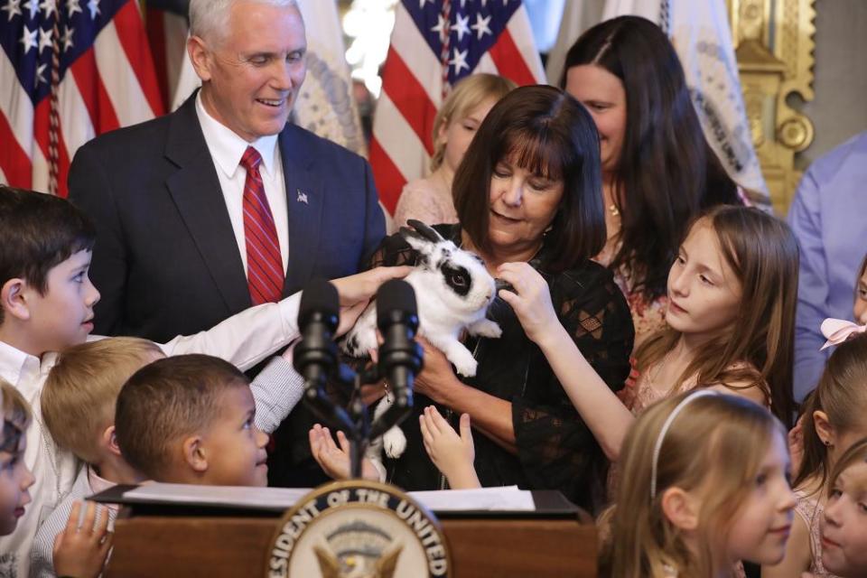 Mike Pence and his wife, Karen Pence, let children pet Marlon Bundo in 2017.