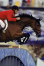 SYDNEY - SEPTEMBER 25: Jonathan Asselin of Canada on Spirit if Xerox II competes in individual qualifyer show jumping at the Sydney International Equestrian Center during the Sydney Olympic Games in Sydney, Australia on September 25, 2000. (Photo by Jamie Squire /Getty Images)