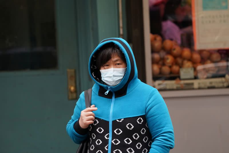 Chinatown residents wear surgical masks in New York City