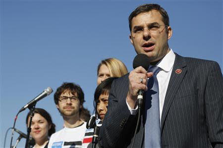 U.S. Representative Justin Amash (R-MI) addresses the "Stop Watching Us: A Rally Against Mass Surveillance" near the U.S. Capitol in Washington, October 26, 2013. REUTERS/Jonathan Ernst