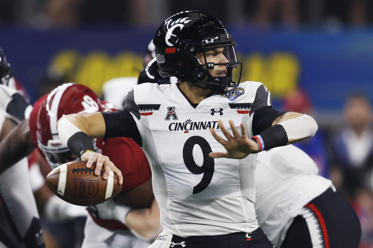 Desmond Ridder of the Cincinnati Bearcats and many other quarterbacks had a long wait until they heard their names called during the NFL draft. (Photo by Ron Jenkins/Getty Images)