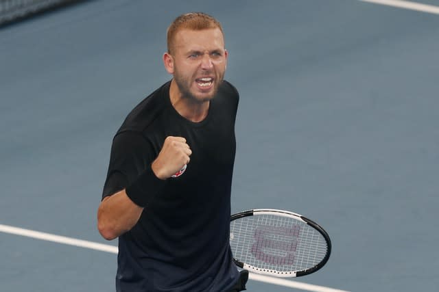 Dan Evans celebrates his victory over Alex De Minaur at the ATP Cup