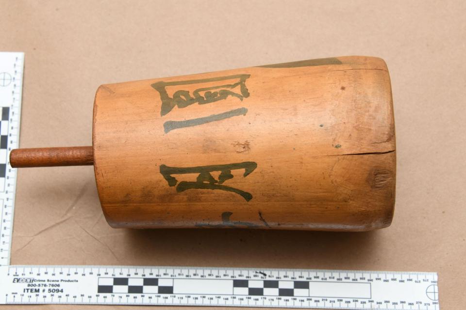 Pictured is a wooden object. The family who found the items in their late father's home checked the FBI's National Stolen Art File to determine that they were indeed looted from Japan. "They did what they should have done, which is call the FBI," Kelly said.