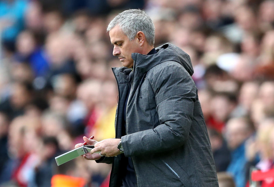 <p>Manchester United boss Jose Mourinho takes notes </p>