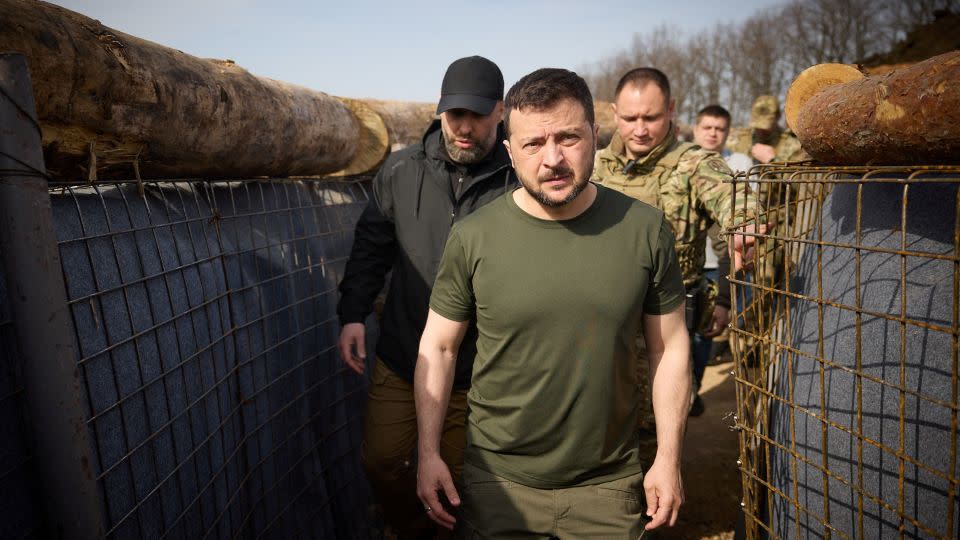 Ukraine's President Volodymyr Zelensky inspects new fortifications for Ukrainian servicemen near the Russian border in the Kharkiv region on Tuesday. - Ukrainian Presidential Press Service/Handout/Reuters