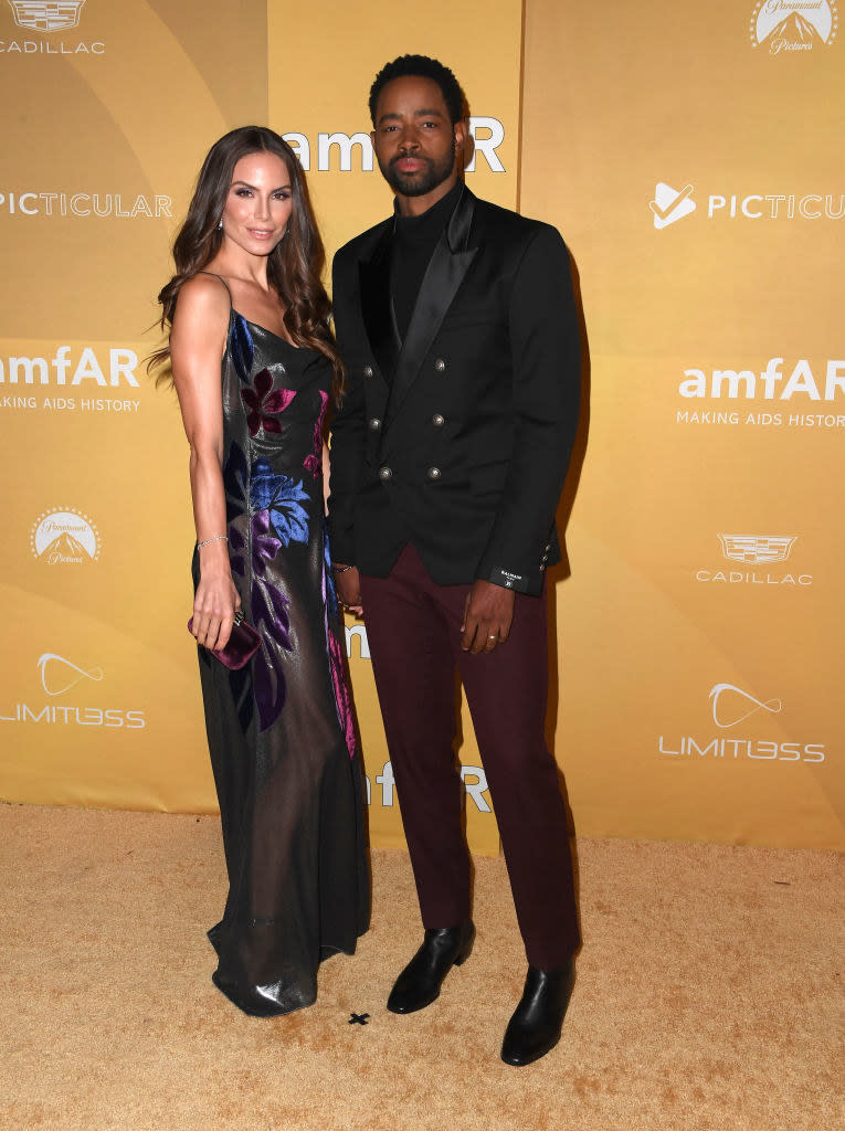 Nina wore a floral-printed spaghetti strap dress and Jay wore a single-breasted suit