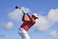 Hideki Matsuyama, of Japan, plays his shot from the 13th tee during the second round of the Tournament of Champions golf event, Friday, Jan. 7, 2022, at Kapalua Plantation Course in Kapalua, Hawaii. (AP Photo/Matt York)
