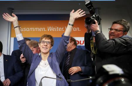 Annegret Kramp-Karrenbauer, State Minister-President and top candidate of the Christian Democratic Union Party (CDU) reacts after the Saarland state elections in Saarbruecken, Germany, March 26, 2017. REUTERS/Kai Pfaffenbach