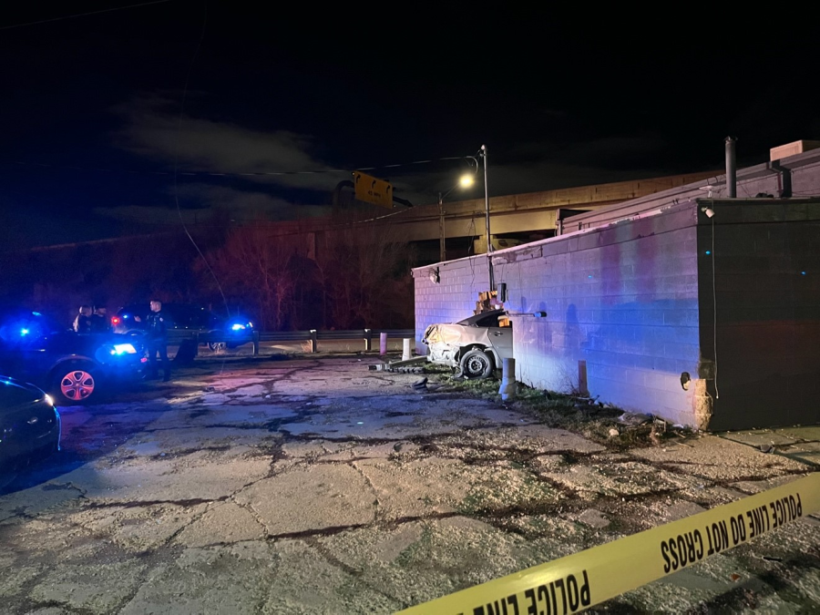 Salt Lake City Police officers and detectives assigned to the Gang Unit investigate a crash near 210 South Pueblo Street that happened following a pursuit on Feb. 4, 2024.