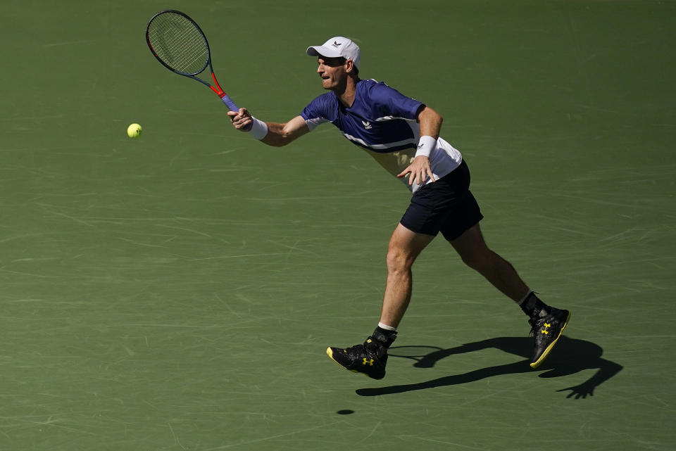Andy Murray, of Great Britain, returns a shot to Emilio Nava, of the United States, during the second round of the US Open tennis championships, Wednesday, Aug. 31, 2022, in New York. (AP Photo/Julia Nikhinson)