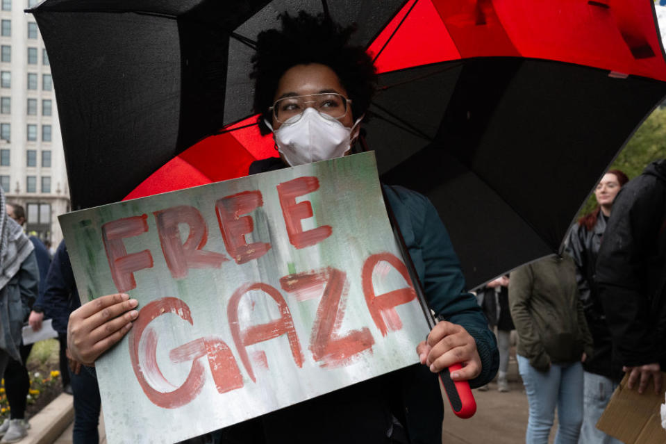 Students and faculty members from the School of the Art Institute of Chicago, Roosevelt College and Columbia College rally and march in Chicago on April 26 to show support for the Palestinians in Gaza. (Photo by Scott Olson/Getty Images)